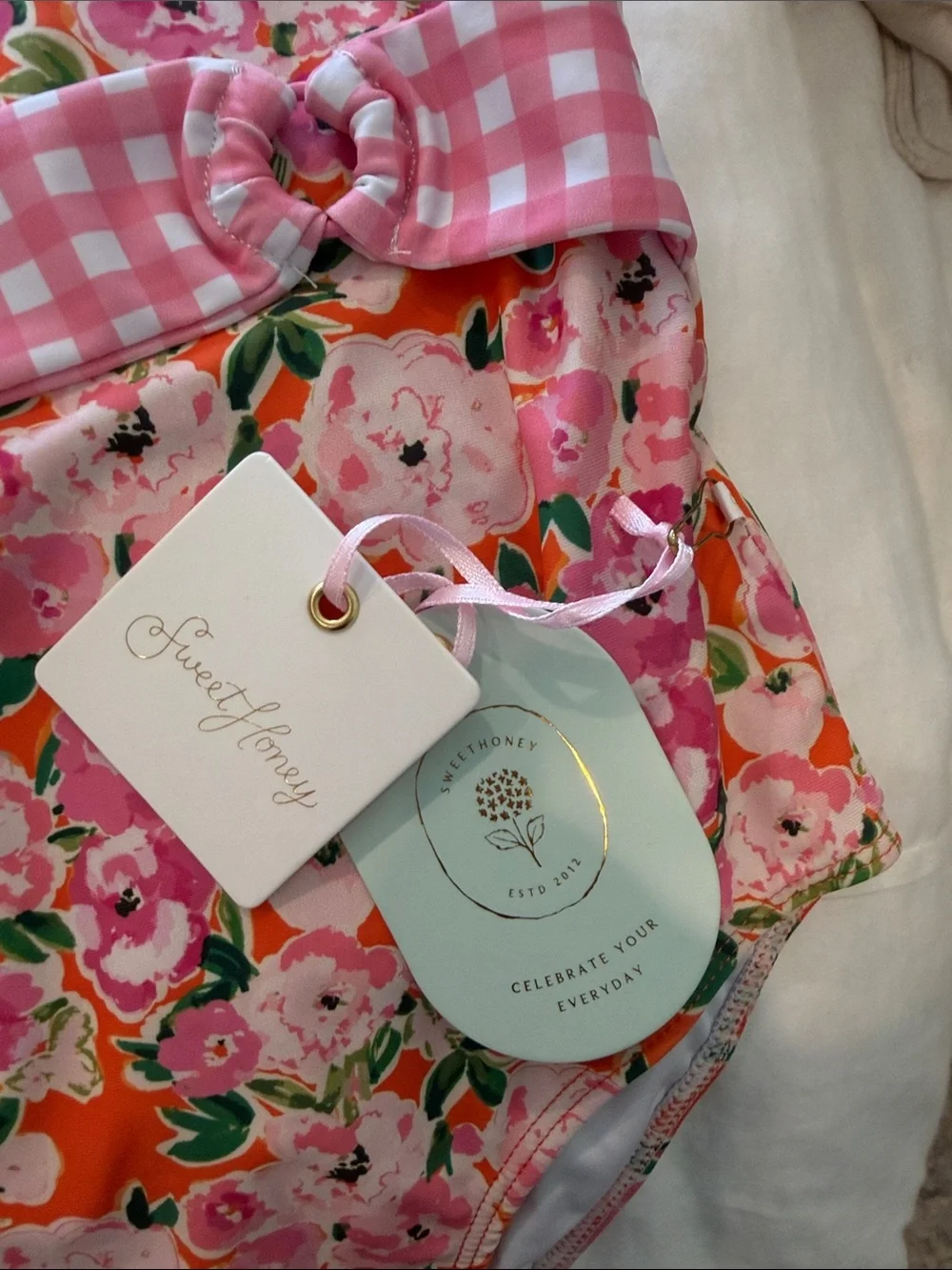 SweetHoney Pink Floral Swim Suit with Orange Background